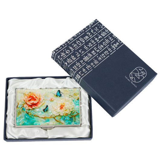 Mother-of-pearl card case with floral butterfly design in silk-lined gift box