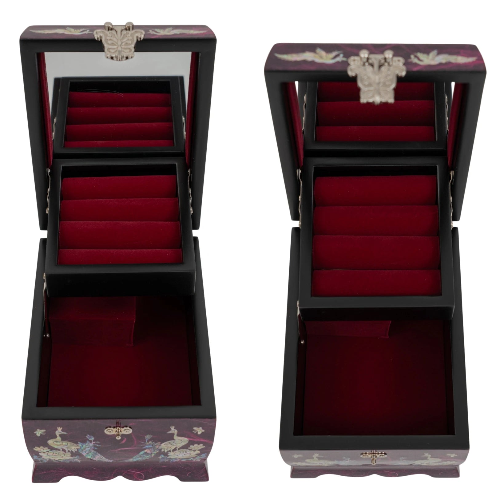 Open purple jewelry box with red velvet lining, featuring a ring organizer, built-in mirror, and iridescent mother-of-pearl peacock designs.