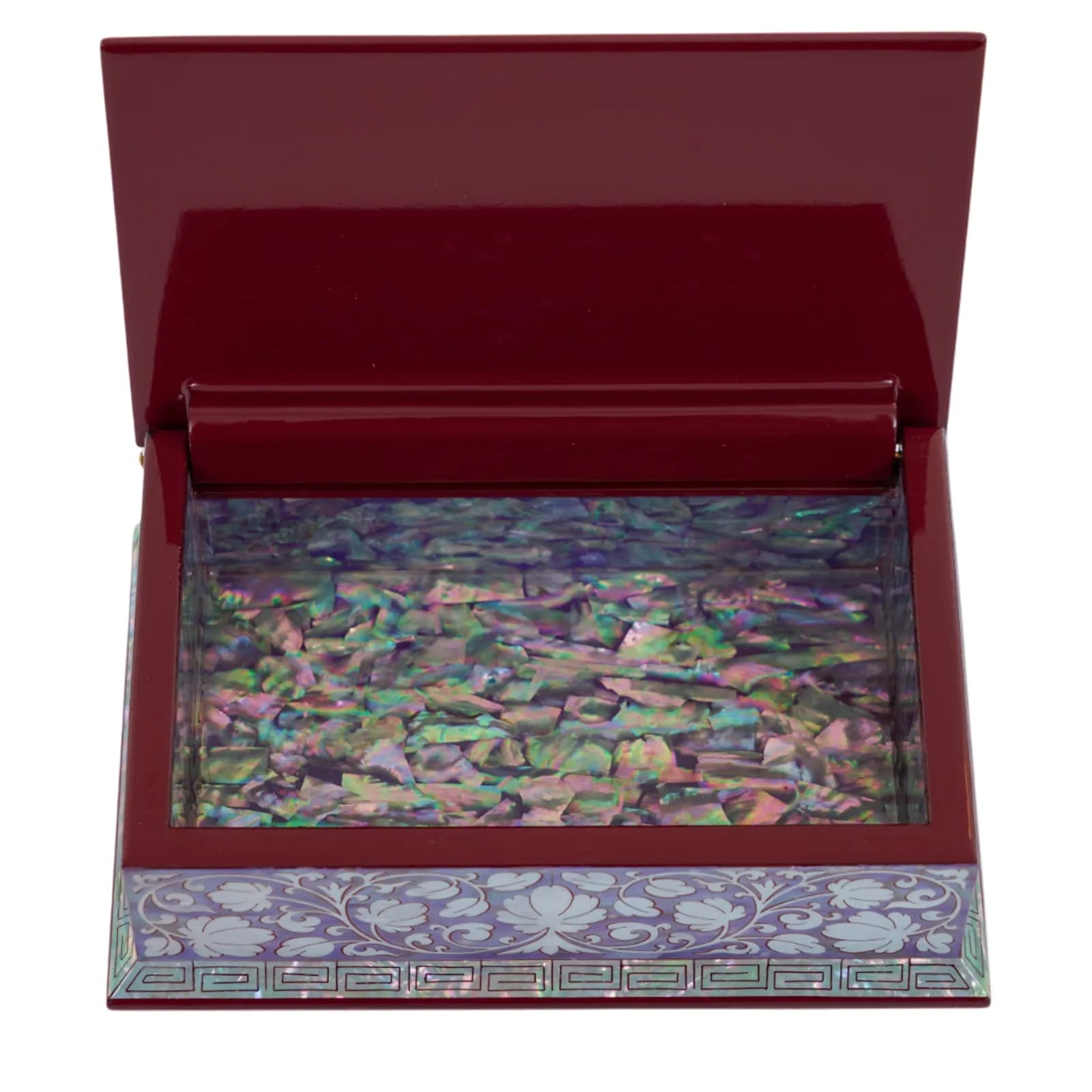 Open view of small red lacquer box lined with glossy abalone shell interior.