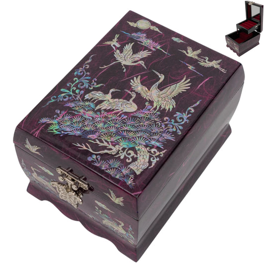 Purple lacquerware jewelry box adorned with iridescent mother-of-pearl inlays of traditional cranes, pine trees, and a full moon.