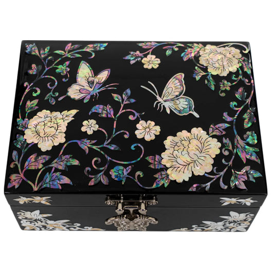 Rectangular lacquer jewelry box with butterfly inlay on white background
