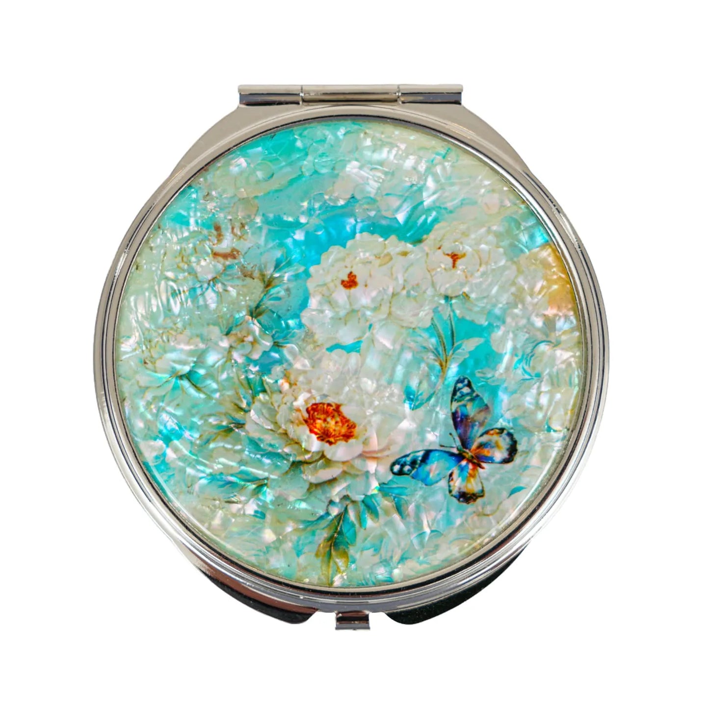 Round mirror with white flowers and butterfly on blue background, front view