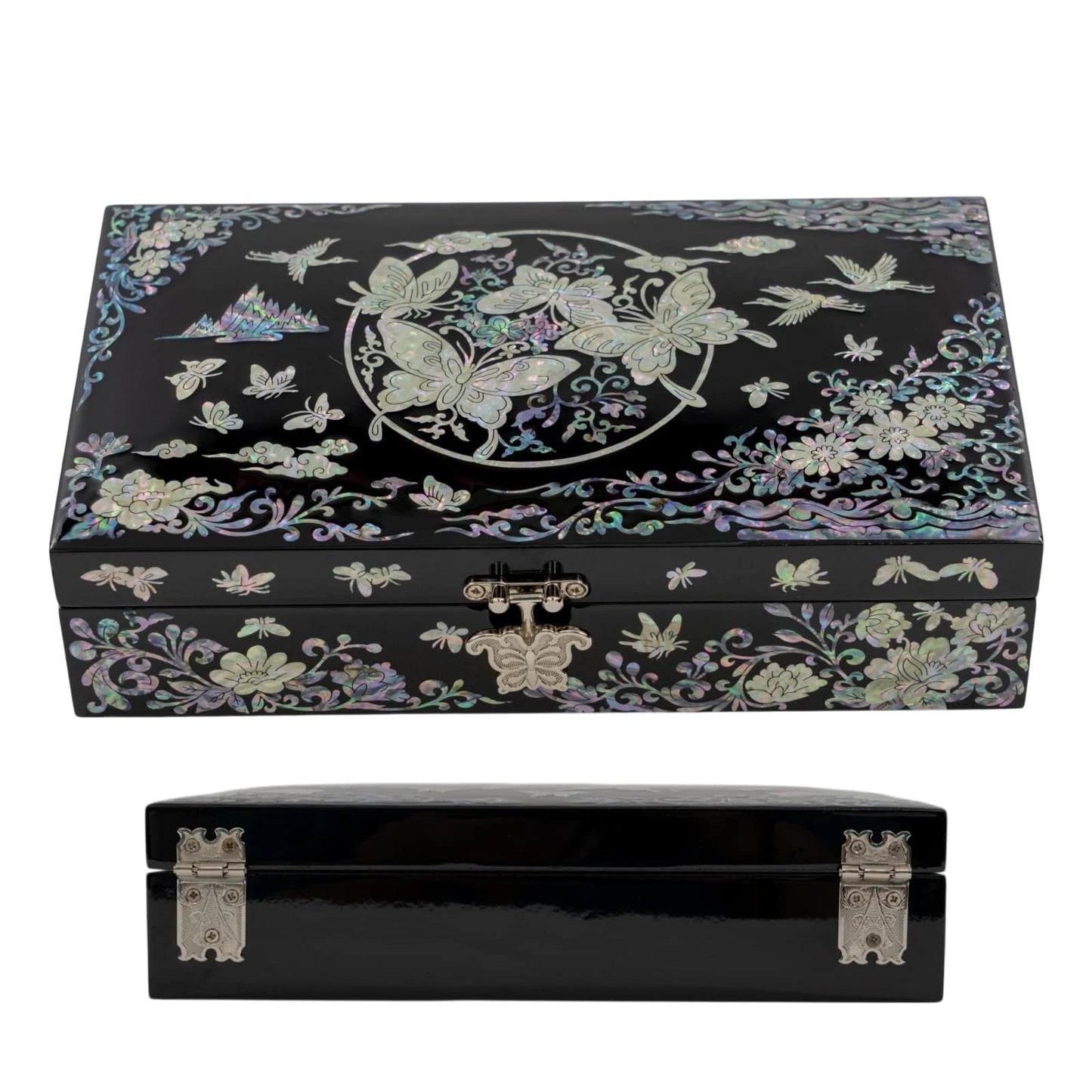 Side-angled view of a black lacquerware box, emphasizing the reflective glossy finish and the distinctive circular butterfly nacre pattern