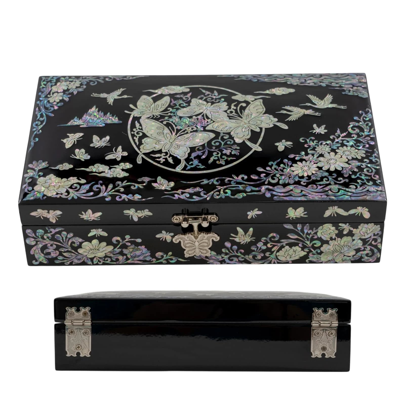 Side-angled view of a black lacquerware box, emphasizing the reflective glossy finish and the distinctive circular butterfly nacre pattern