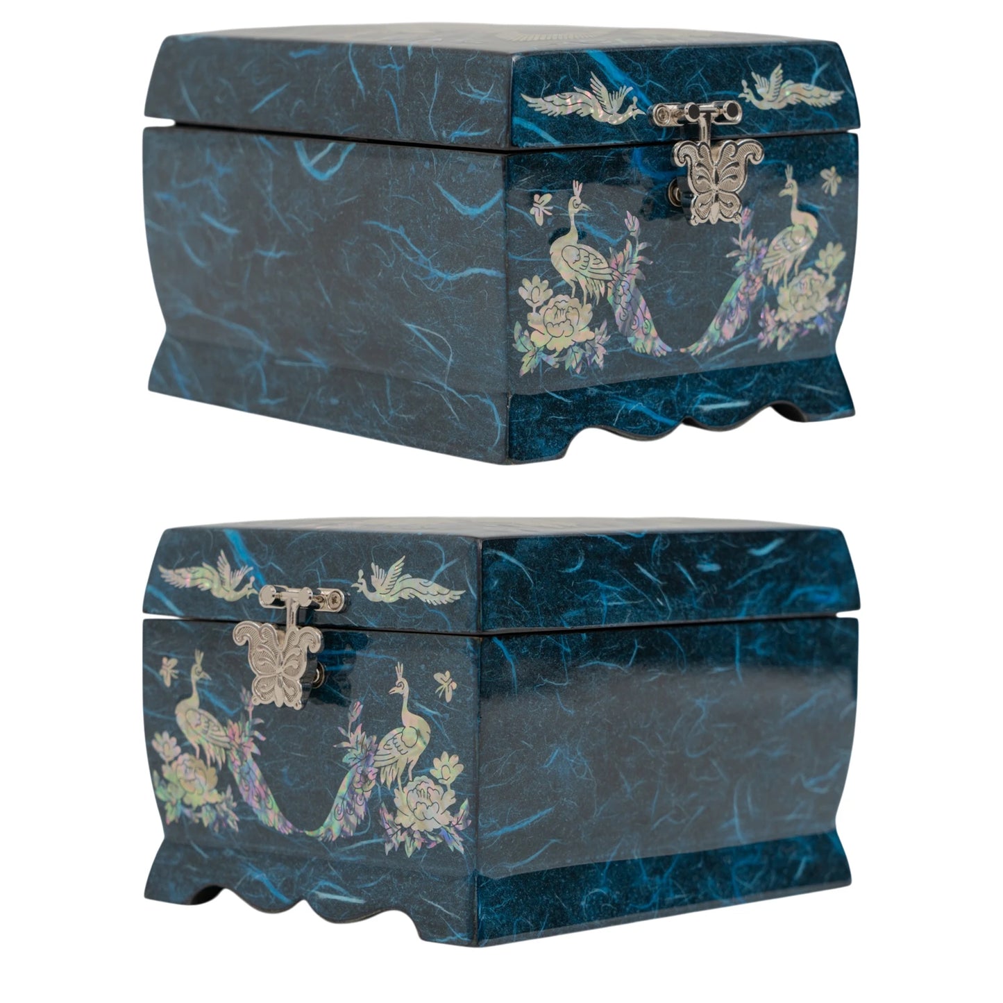 Side and front views of a dark blue jewelry box with a marbled pattern, decorated with shimmering mother-of-pearl peacocks and flowers.