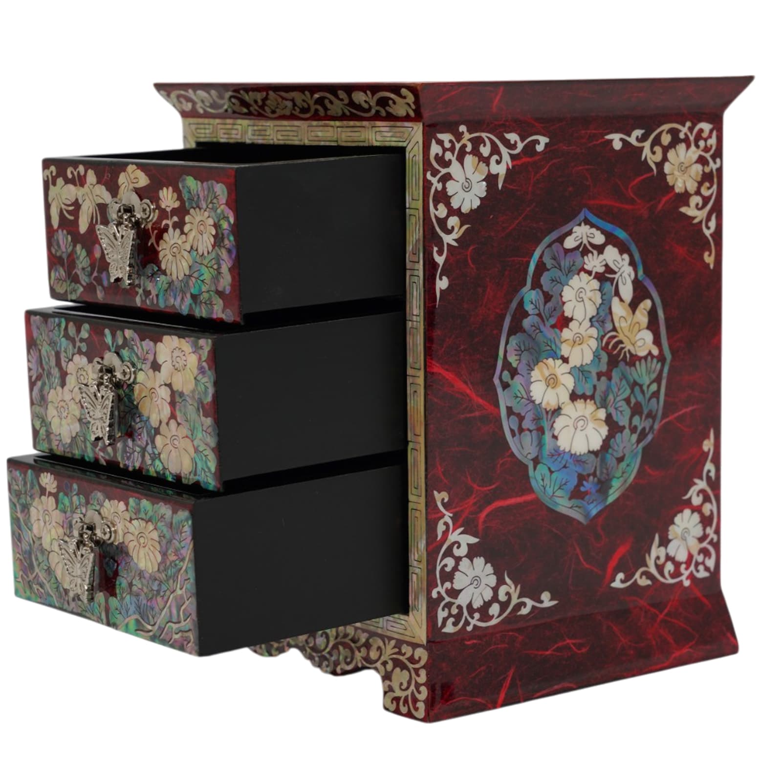 Side view of Korean lacquer box with white floral mother of pearl inlay. Decorative butterfly-shaped drawer pulls. Artisan-made traditional jewelry chest