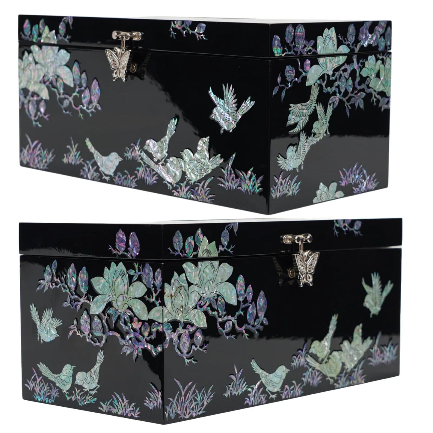 Side view of black tissue box showing abalone bird and floral patterns