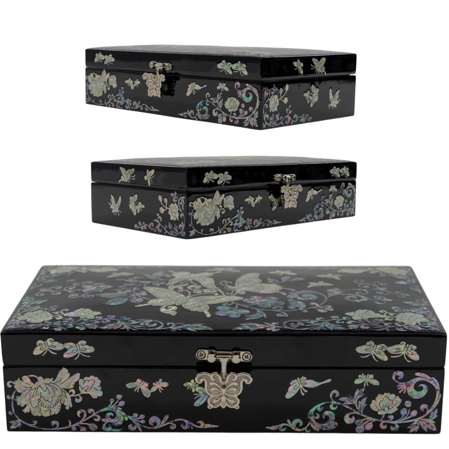 Symmetrical front view of a black keepsake box with shimmering nacre butterfly and vine designs, centered with an ornate metal l