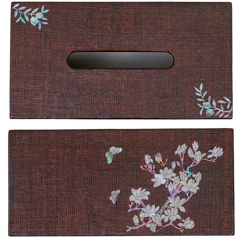 The image shows a brown tissue box cover with delicate mother-of-pearl inlay featuring birds and flowers on one side and a solitary butterfly near the slit on the other side.