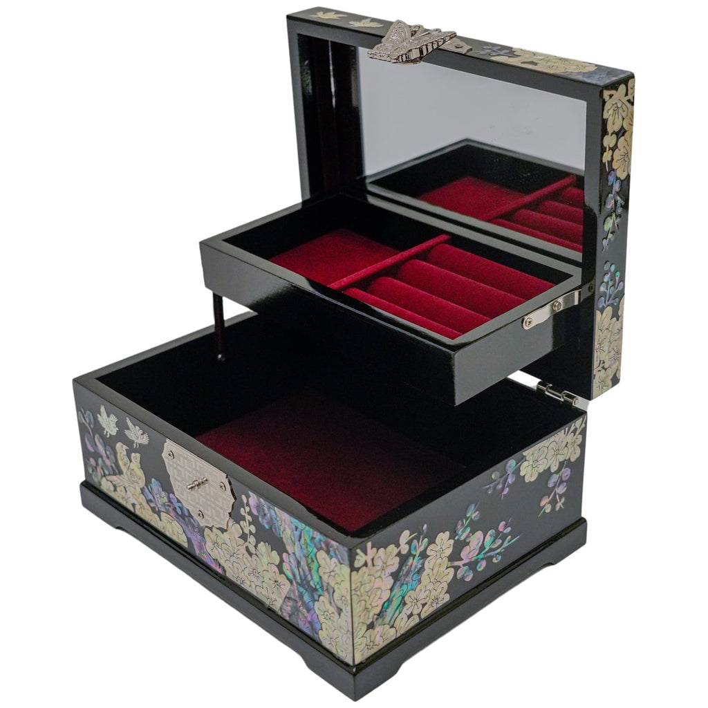 This image shows the decorative box with both compartments open. The top tray is hinged and swings out to reveal the larger compartment underneath. The tray has smaller velvet-lined sections designed for storing rings or earrings, while the bottom compartment provides space for larger items. The craftsmanship of the box, with its mother-of-pearl inlay and velvet interior, suggests that it is designed for elegance and to protect delicate items like jewelry.