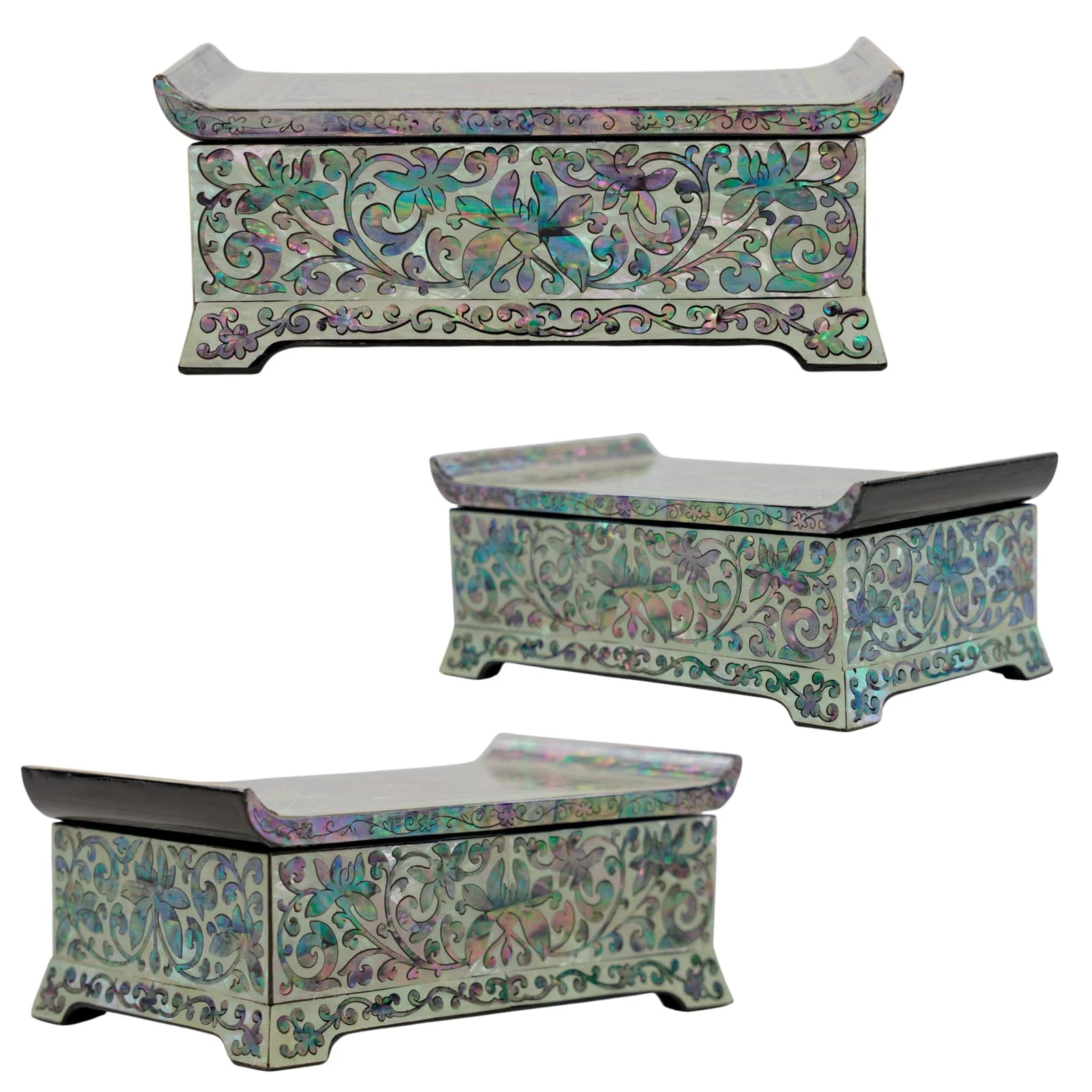 Three-view angle of a lacquer box showing side floral shell patterns. Displays the curved lid and detailed craftsmanship from all sides