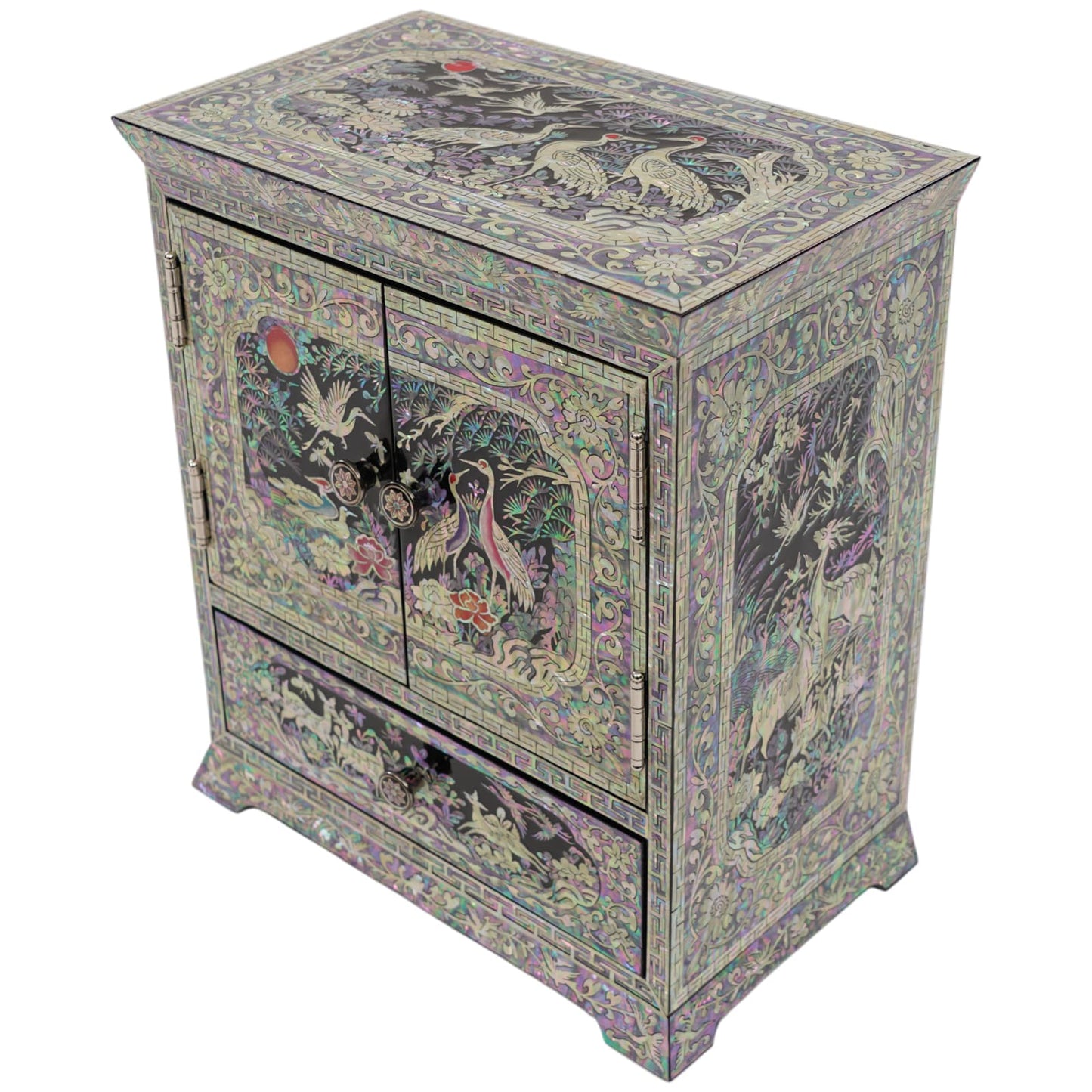 Top-down perspective of a black lacquer jewelry box showcasing detailed mother of pearl craftsmanship and shimmering floral patterns