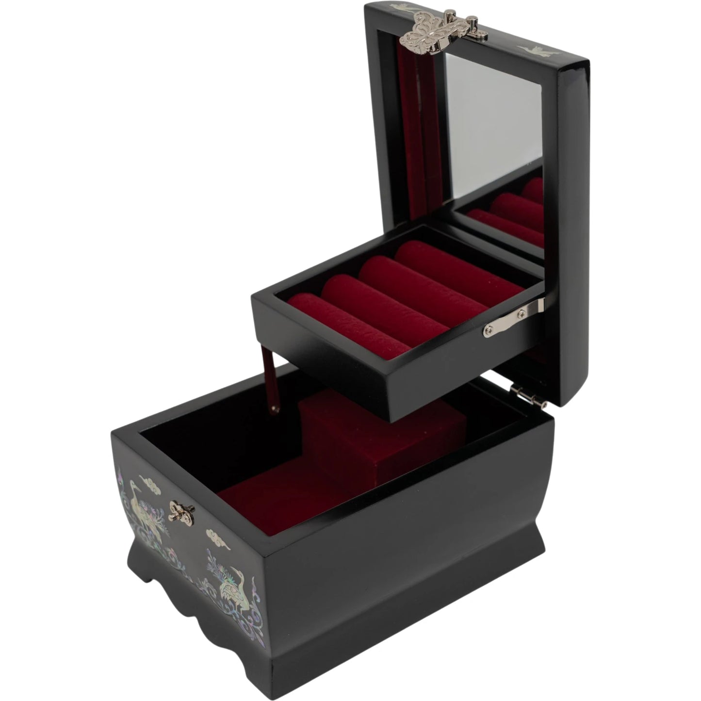 An angled view of an open black jewelry box showing red velvet ring rolls, a lower compartment, a mirror, and mother-of-pearl birds.