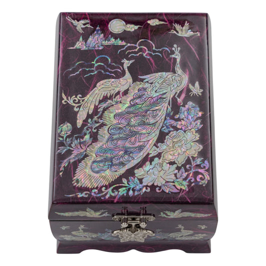 Top-down view of a purple textured jewelry box with iridescent peacocks and floral inlays, secured by a decorative silver butterfly latch.