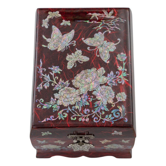 Top view of a red lacquer box lid decorated with iridescent mother-of-pearl butterflies, flowers, and traditional crane motifs in the clouds.