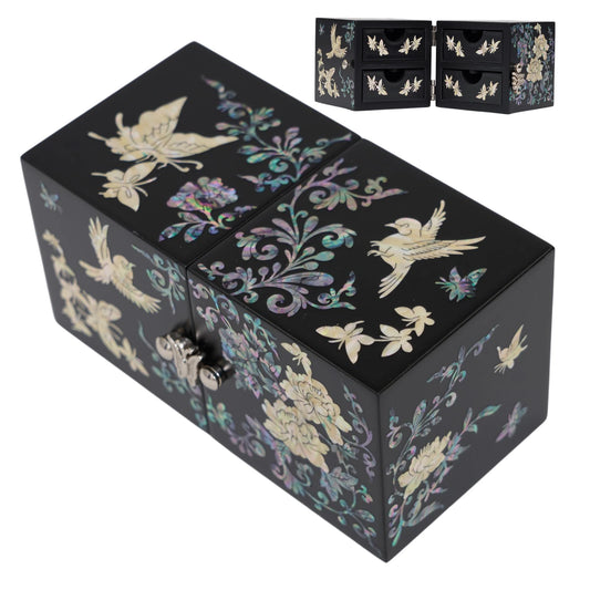 Top view of closed black lacquer box with flowers and birds, featuring inset of open interior with small drawers