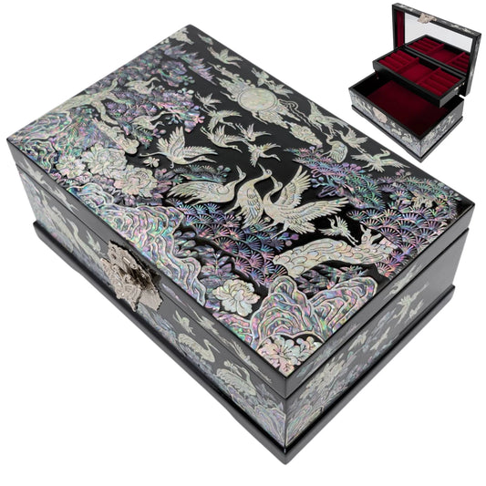 Top view of closed crane lacquer jewelry case with an inset showing open red velvet drawers for ring organizer storage