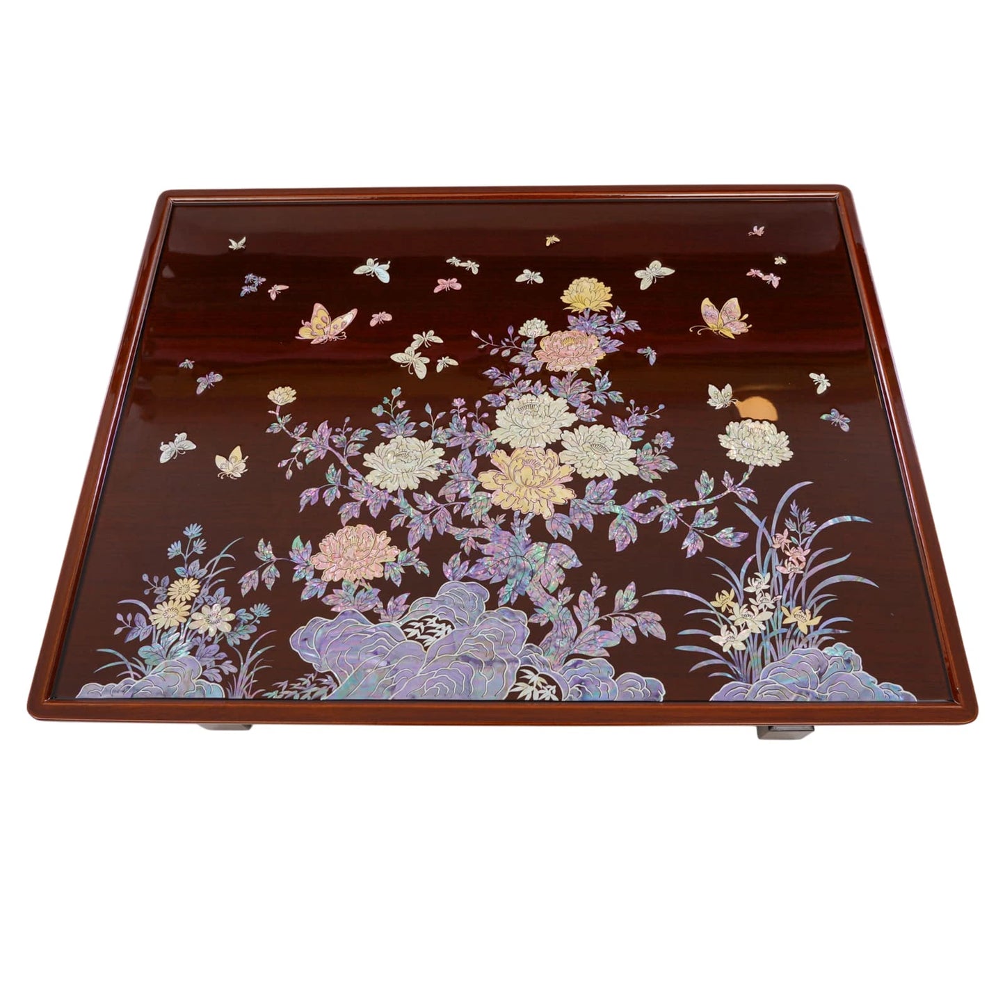 Top view of rectangular Korean mother of pearl inlay table featuring peony flowers, butterflies, and iridescent shell detailing on dark wood