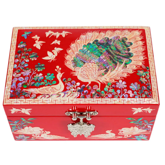 Top view of red jewelry box with colorful peacocks, butterflies, and floral inlay