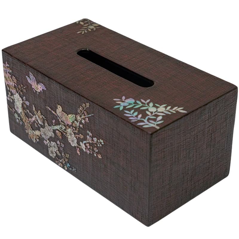 A rectangular brown tissue box holder with a textured finish and mother-of-pearl inlay of birds and flowers on one side.