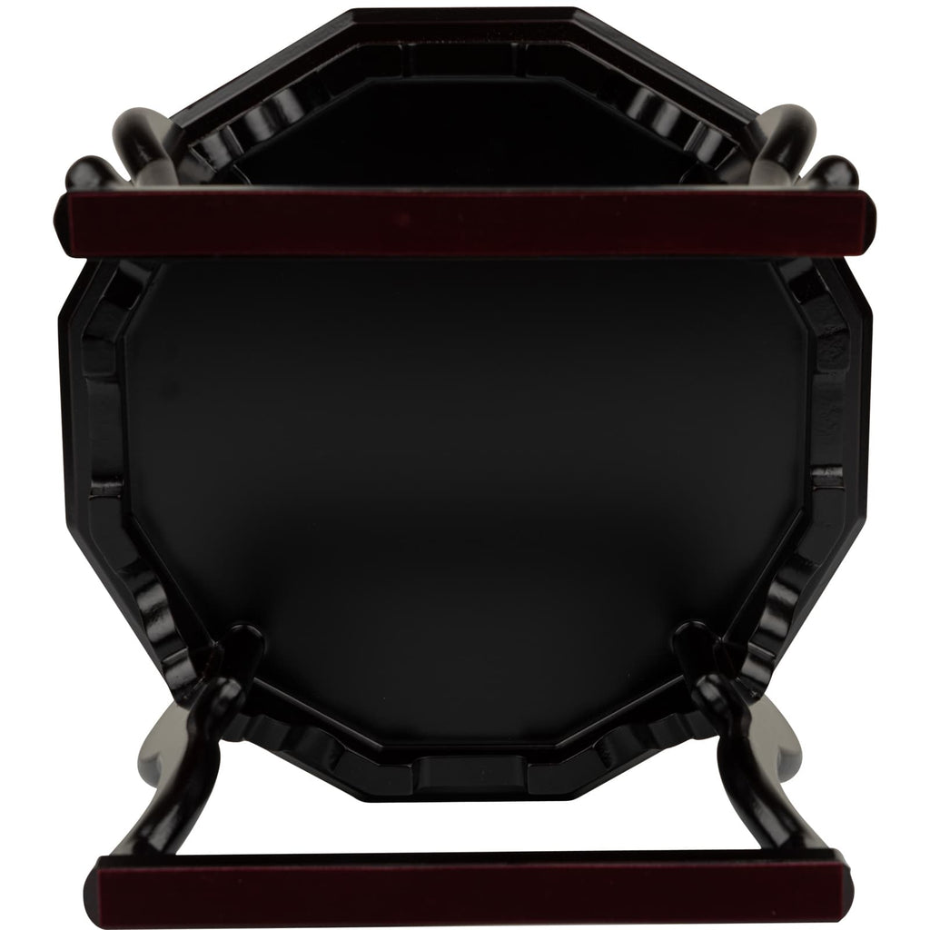 An octagonal black lacquer tea table top viewed directly from above, revealing its sleek surface and edges, mounted on a rich burgundy stand.