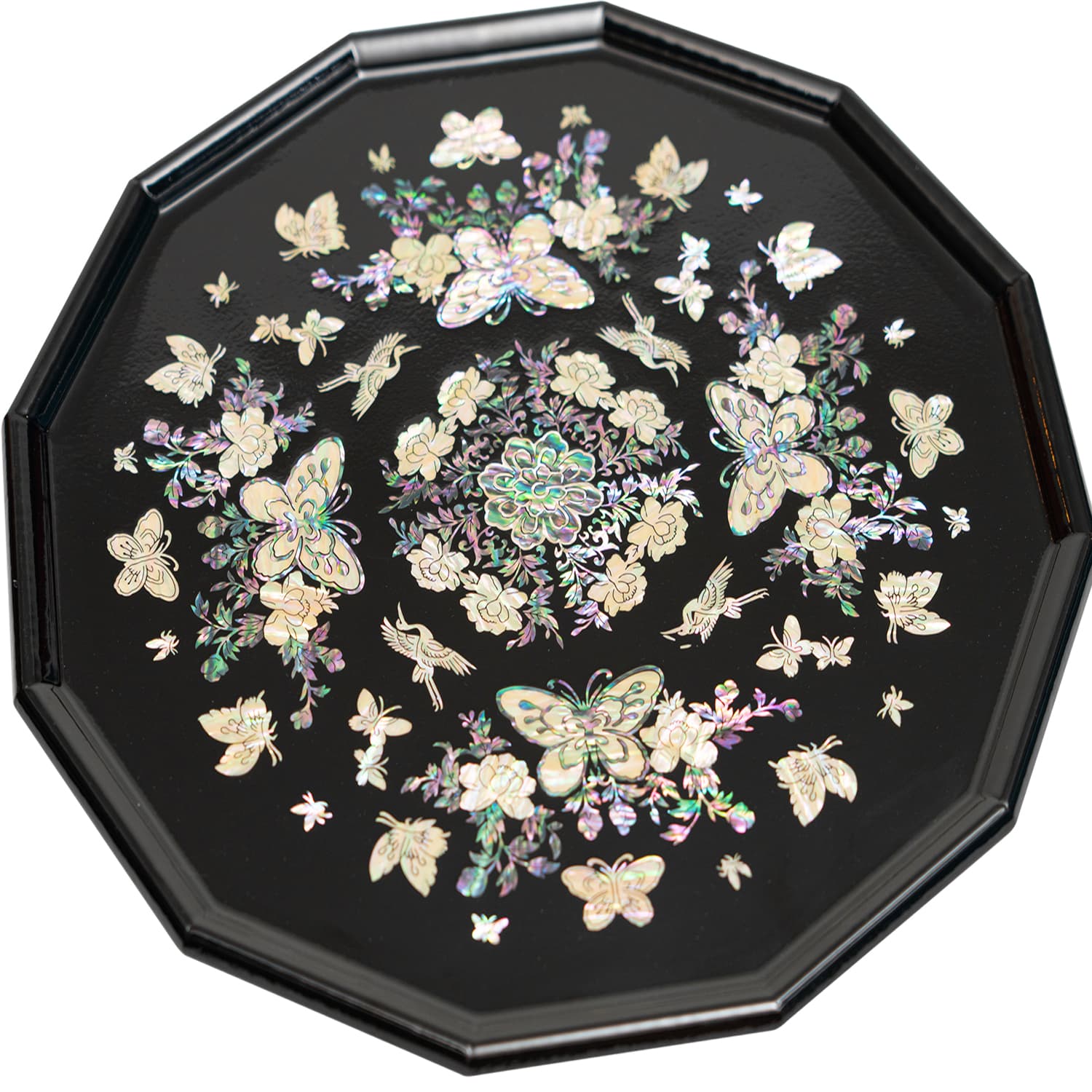 An octagonal tray with mother-of-pearl inlay featuring butterflies and flowers on a black background.