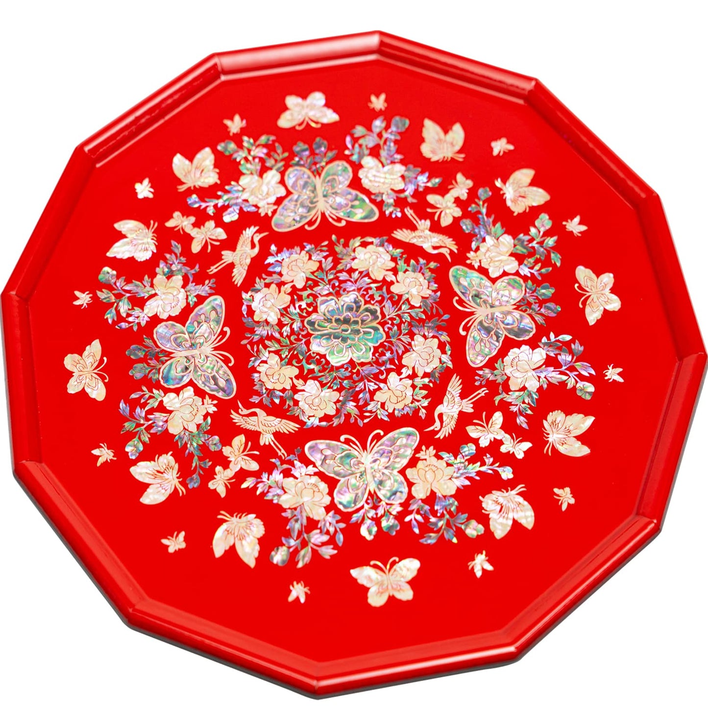 An octagonal tray with mother-of-pearl inlay featuring butterflies and flowers on a red background.