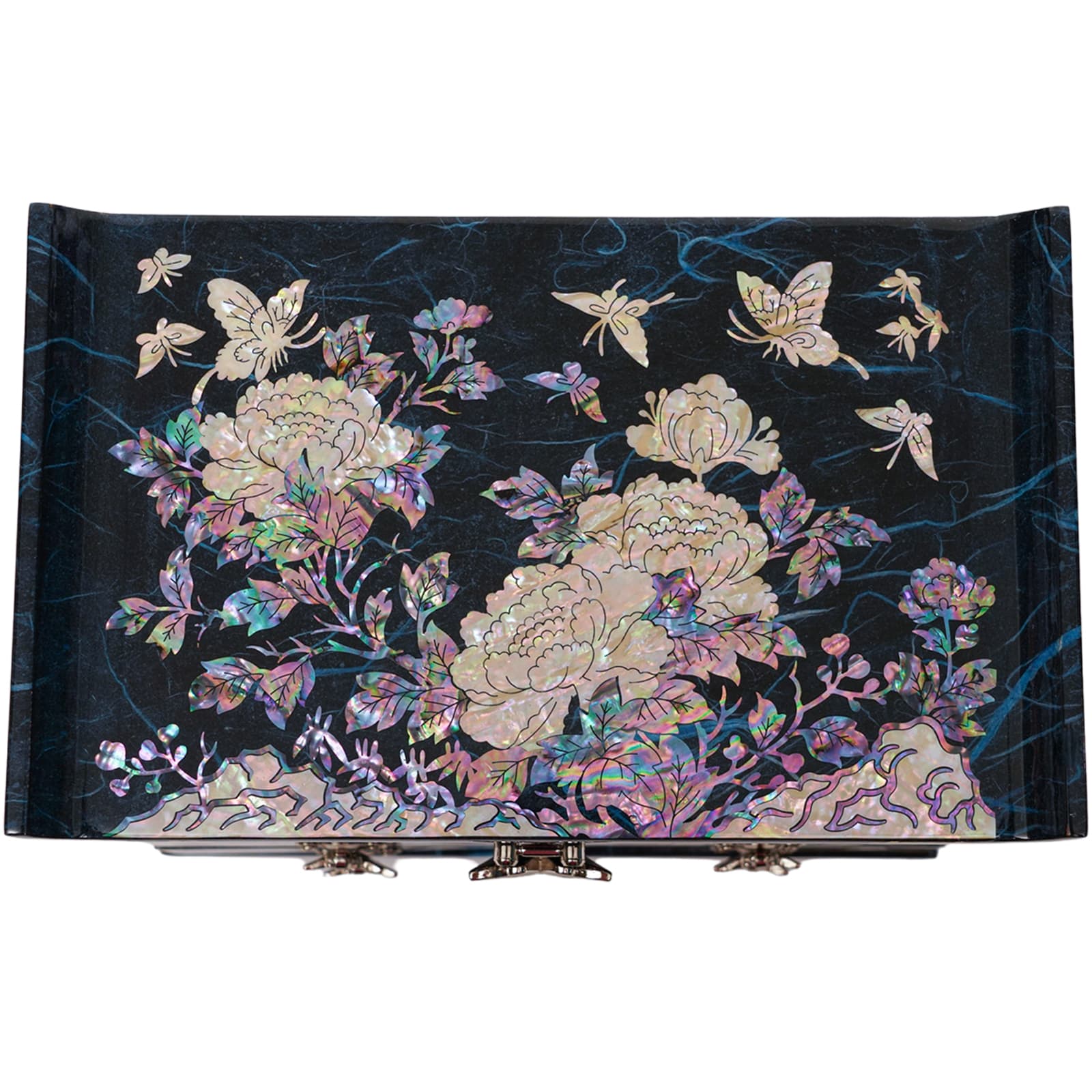 A close-up view of a mother-of-pearl inlaid jewelry box lid with peony flowers and butterflies.