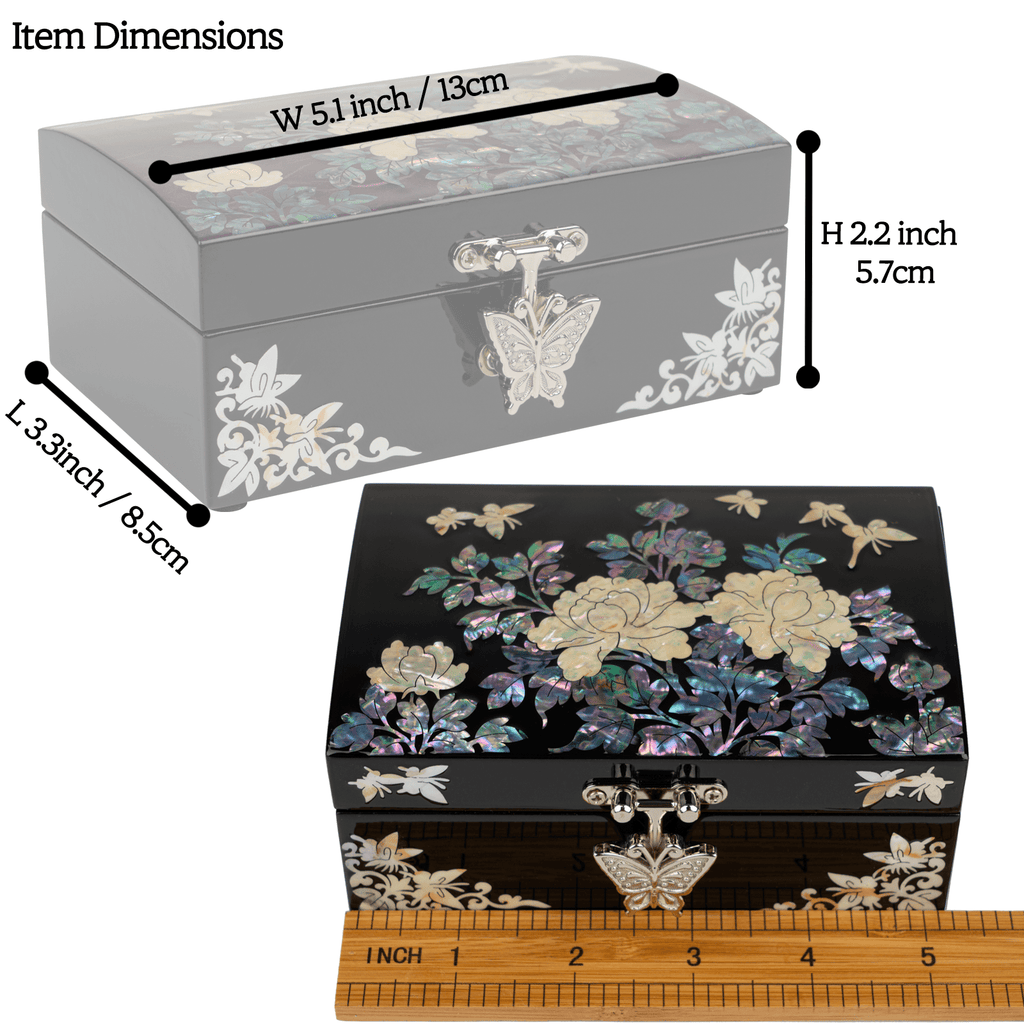 A closed gray jewelry box with mother-of-pearl butterfly inlay and a black box with floral design, shown with a ruler for scale. Dimensions labeled.