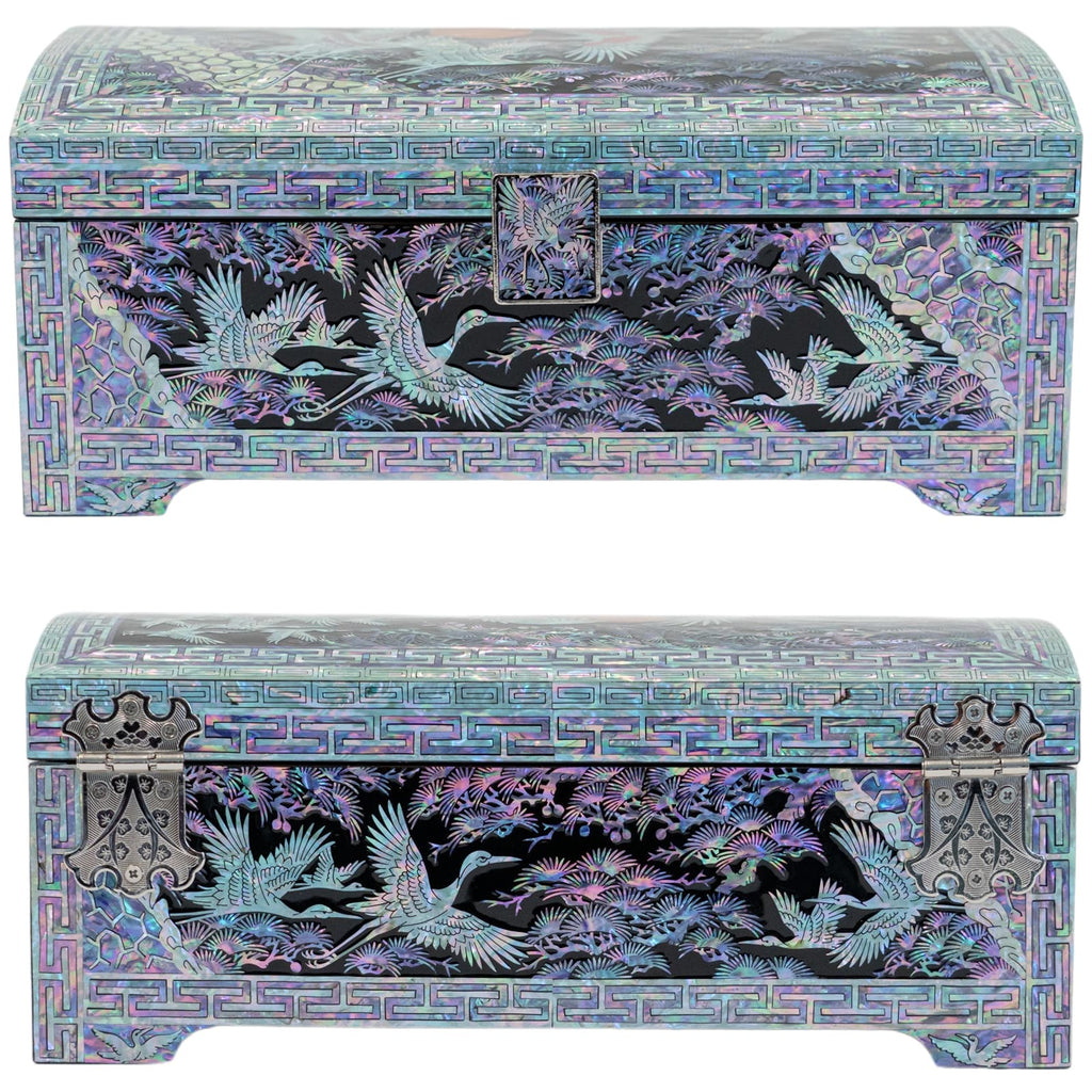 Two Mother of Pearl boxes with crane and pine tree motifs, front and back views showing intricate details and metallic closures.