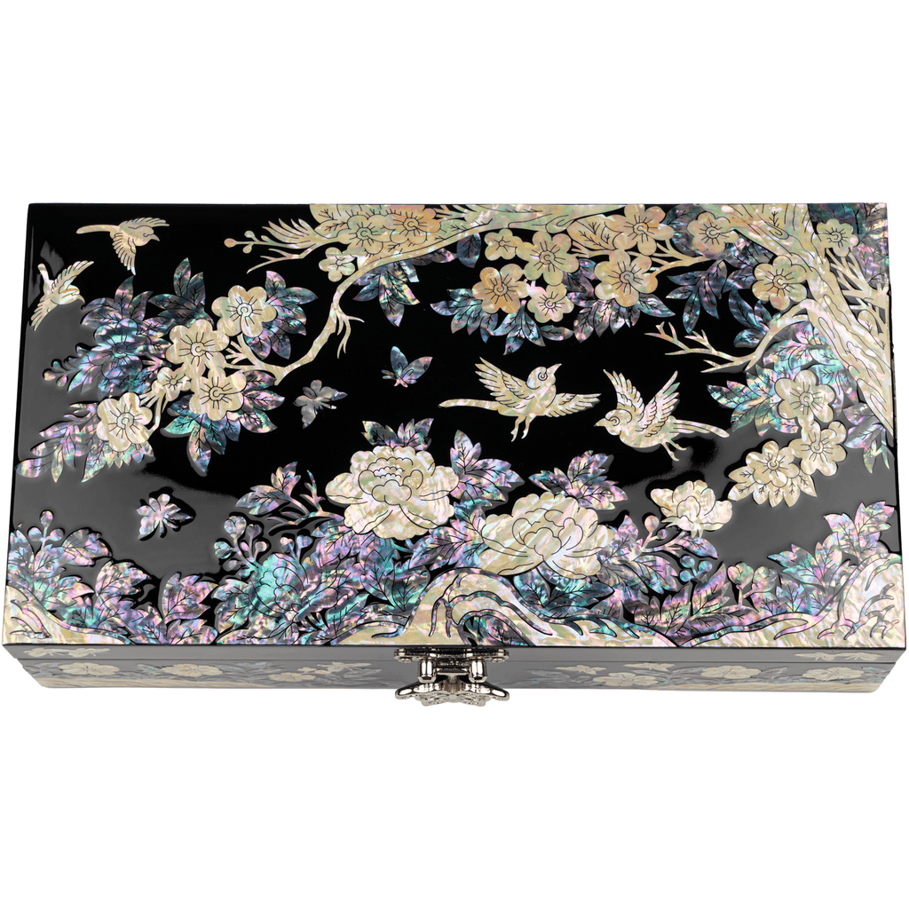  A black jewelry box adorned with vibrant mother-of-pearl inlays showcasing peonies, butterflies, and foliage. The box features a front clasp and intricate corner detailing.