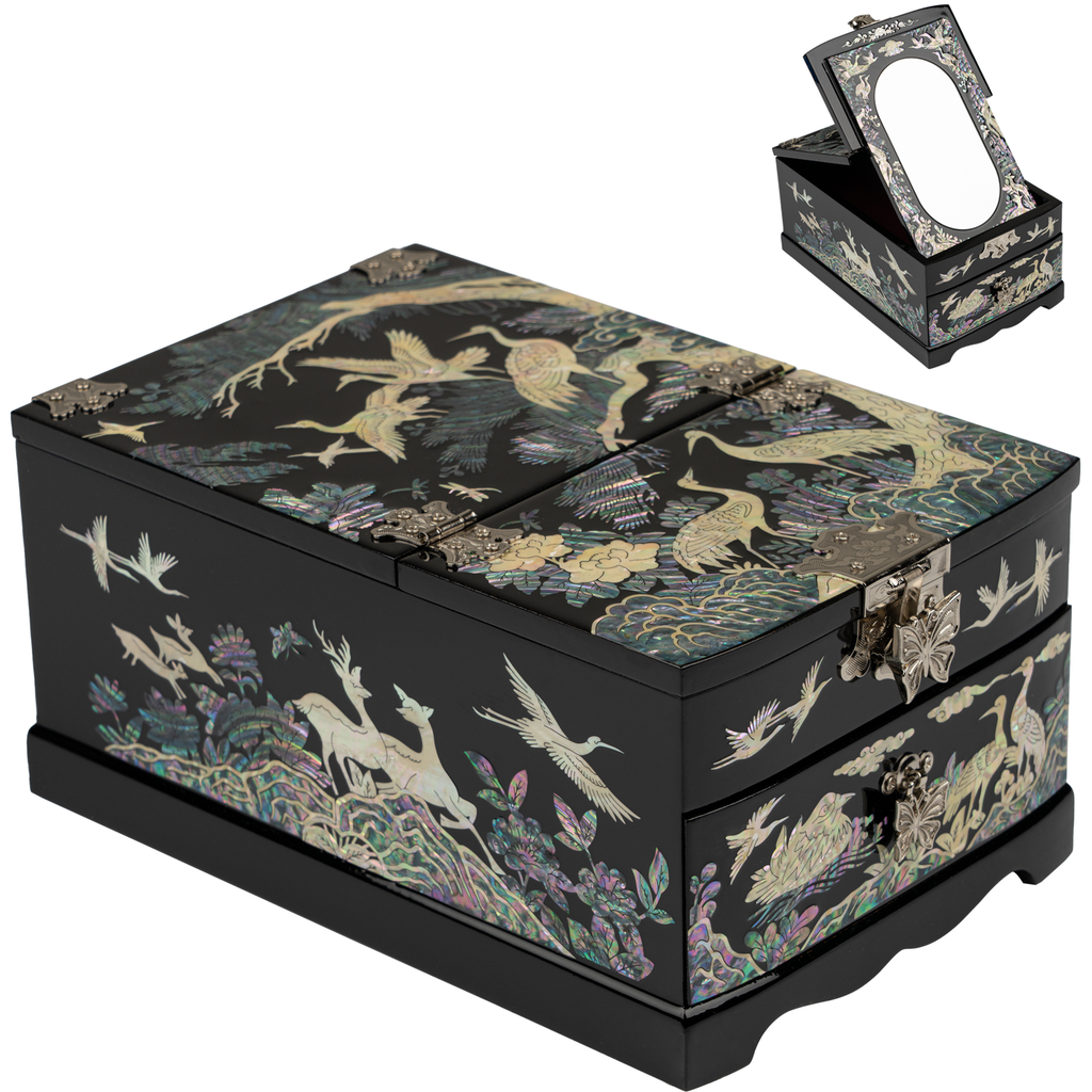 A black Mother of Pearl jewelry box with intricate crane and floral designs, showcasing exquisite craftsmanship and oriental style.