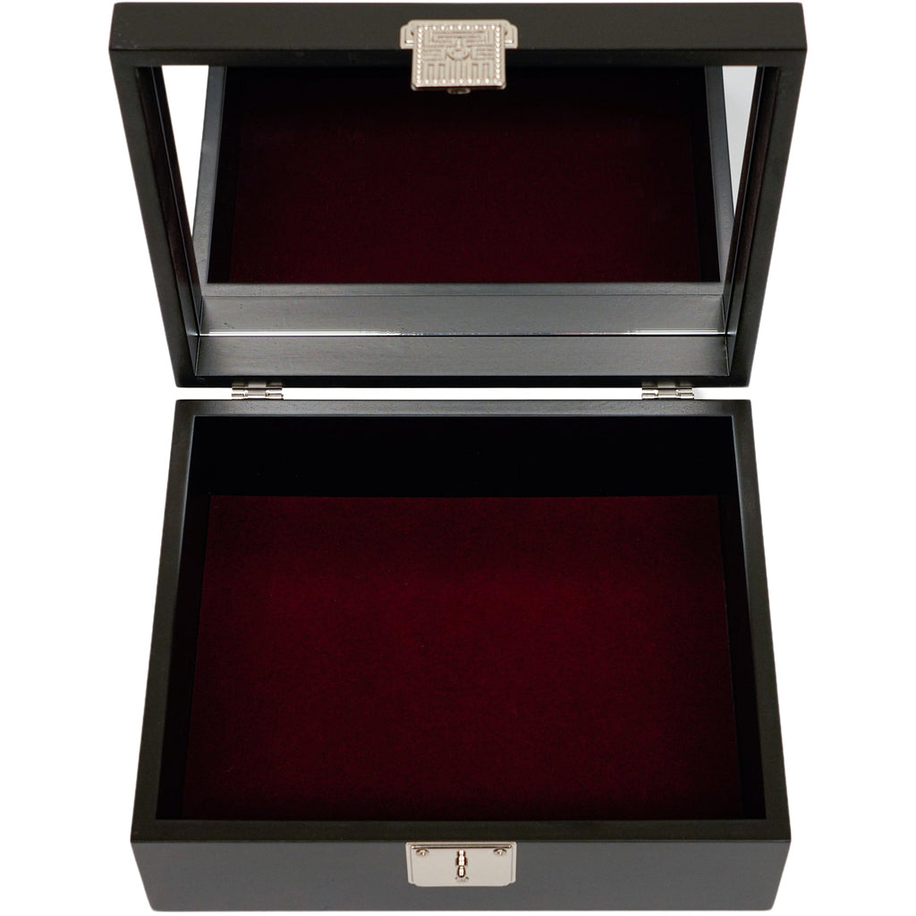 An open jewelry box with a mirror under the lid and a soft velvet lining for jewelry protection.