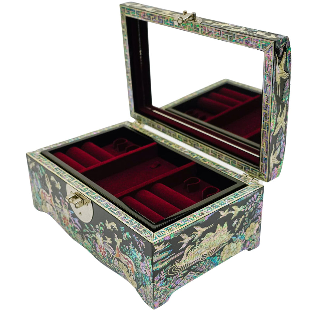 The photo shows a Mother of Pearl jewelry box opened at a 45-degree angle, displaying intricate designs on the exterior with a mirror inside the lid and red velvet compartments for storing jewelry.