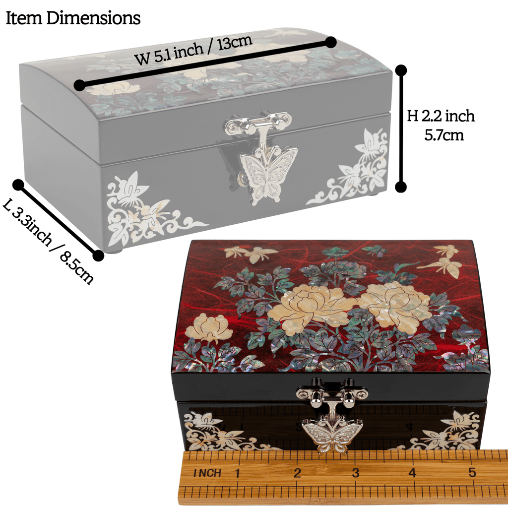 A closed jewelry box with mother-of-pearl butterfly inlay and a black box with floral design, shown with a ruler for scale. Dimensions labeled.