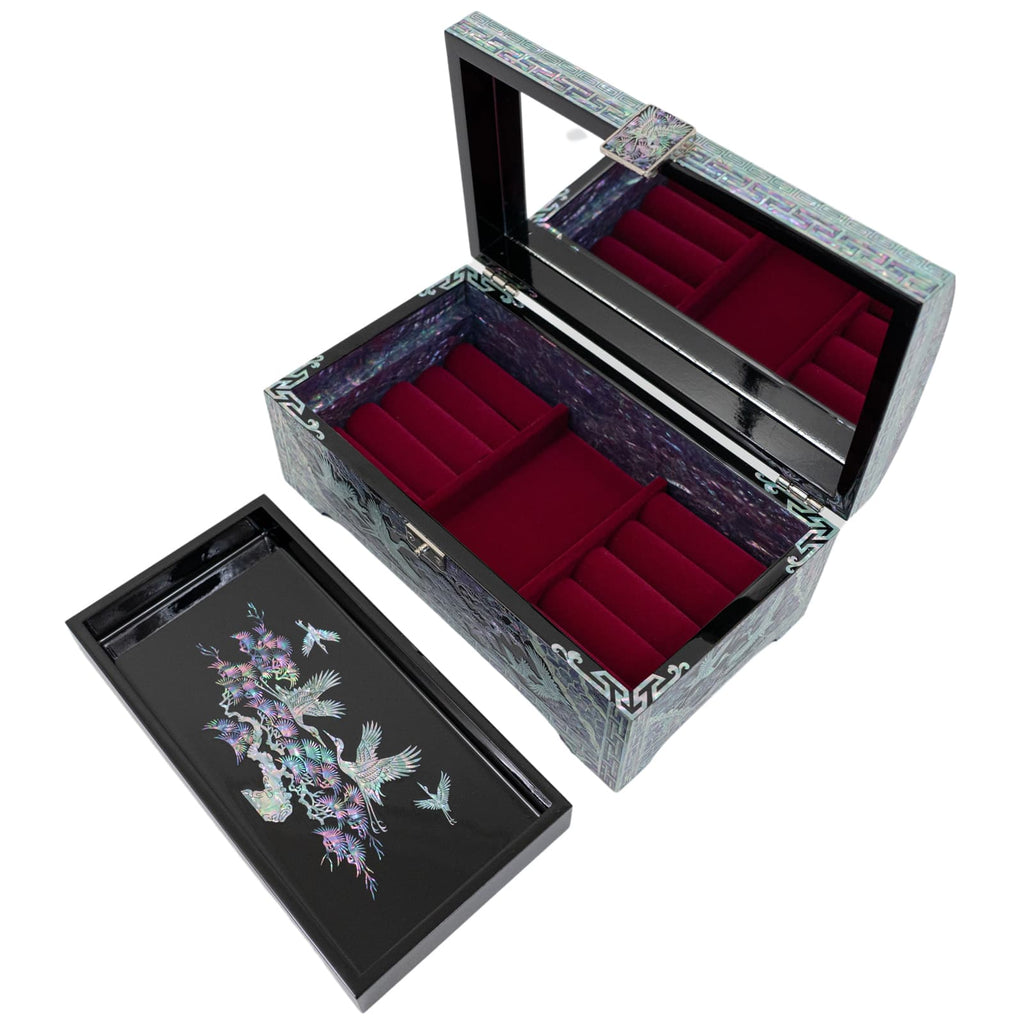 The image features an open jewelry box with a removable tray, showcasing intricate mother-of-pearl designs and a velvet-lined interior
