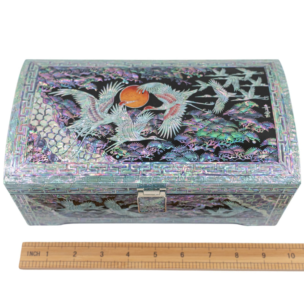 The image shows a closed jewelry box with an iridescent mother-of-pearl design and a ruler for scale, indicating the box's dimensions W 9.6inch L 5.3inch H 3.7inch