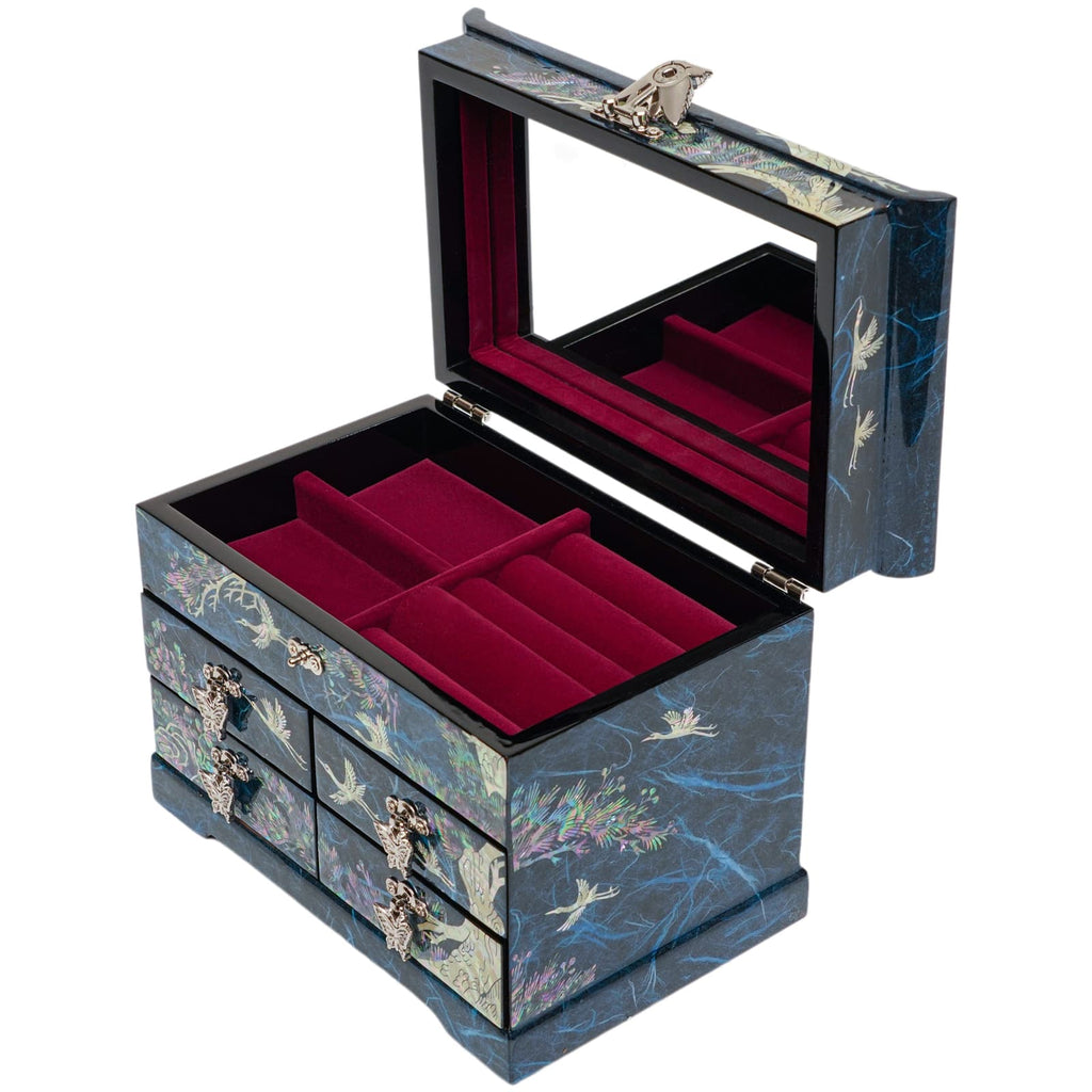 A luxurious Korean jewelry box with a mother-of-pearl inlay, showcasing cranes and pine tree design, featuring a mirror inside the lid and plush red velvet compartments.