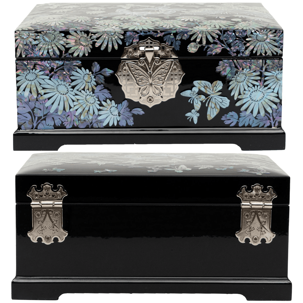 Front and back views of a black jewelry box with mother-of-pearl inlay featuring chrysanthemums and butterflies, with ornate metal clasps.