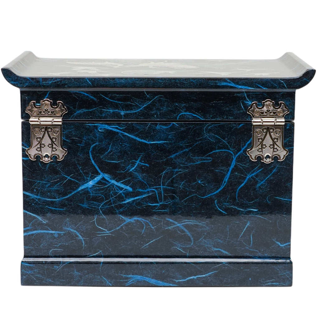 A blue mother-of-pearl jewelry box with intricate detailing and silver clasp, displaying a traditional Korean design on the back side.